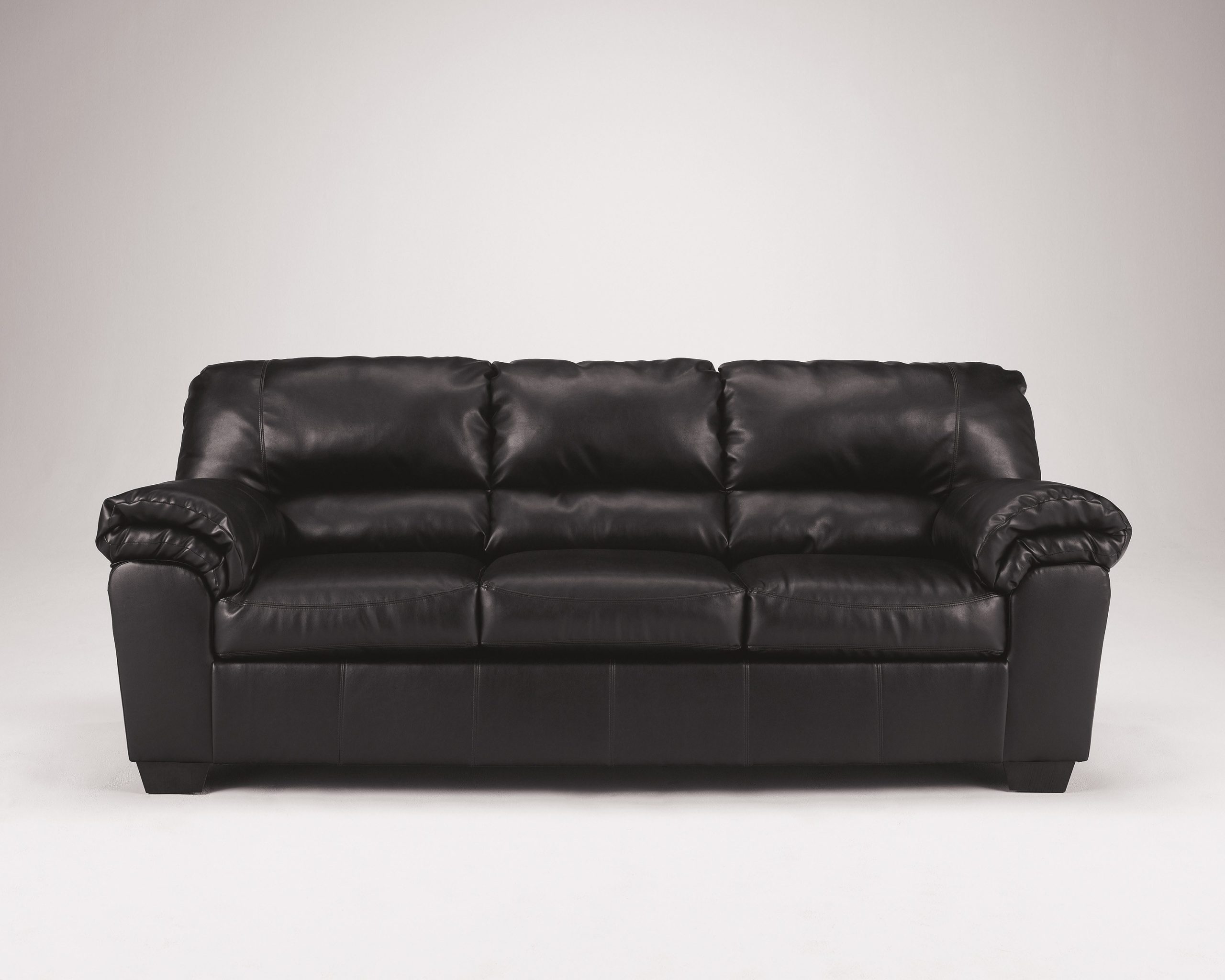signature design by ashley commando black leather sofa
